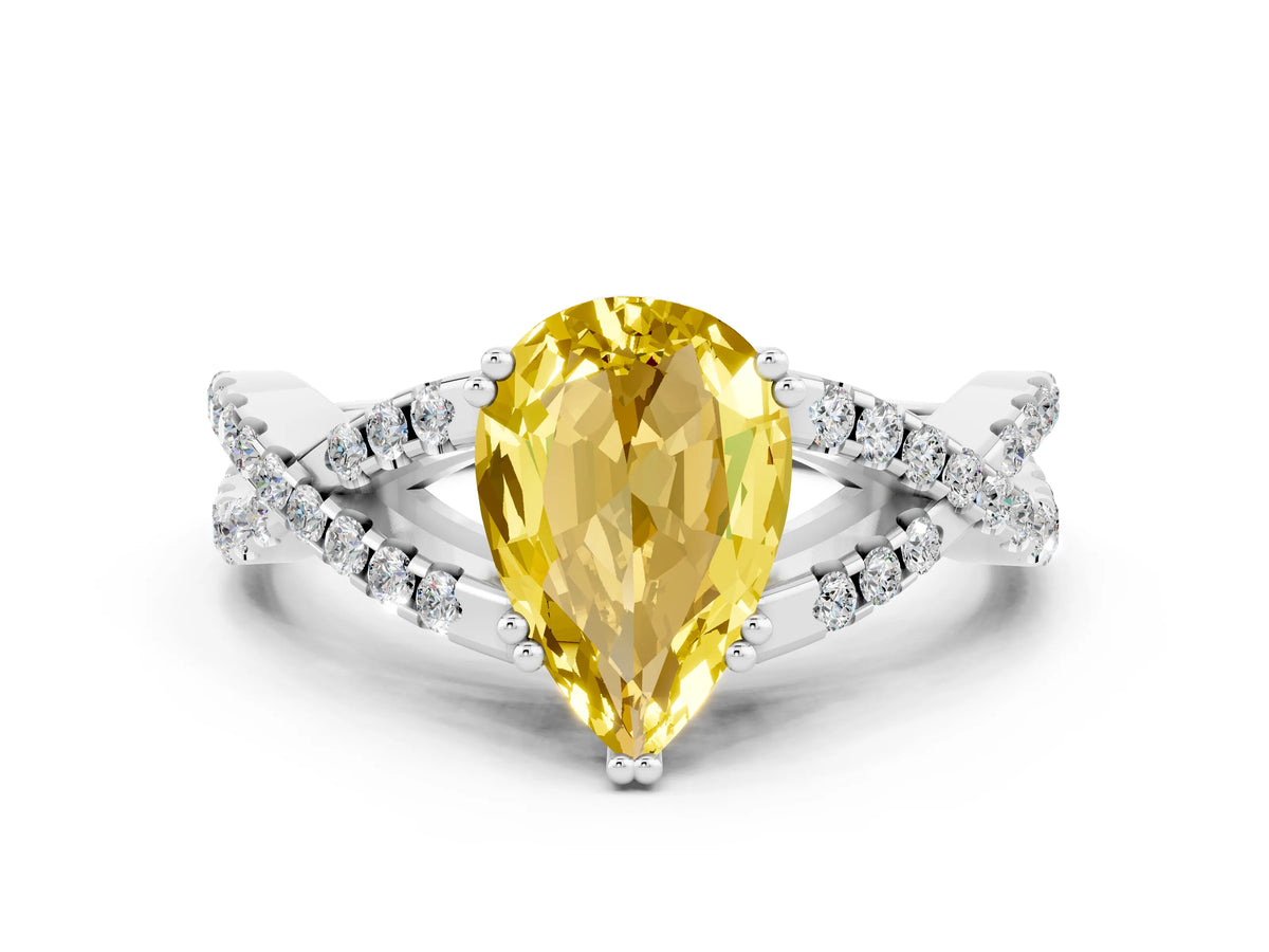 Pear Cut Yellow Sapphire Solitaire Ring in White gold with Interwoven Pavé Band and Prong Setting