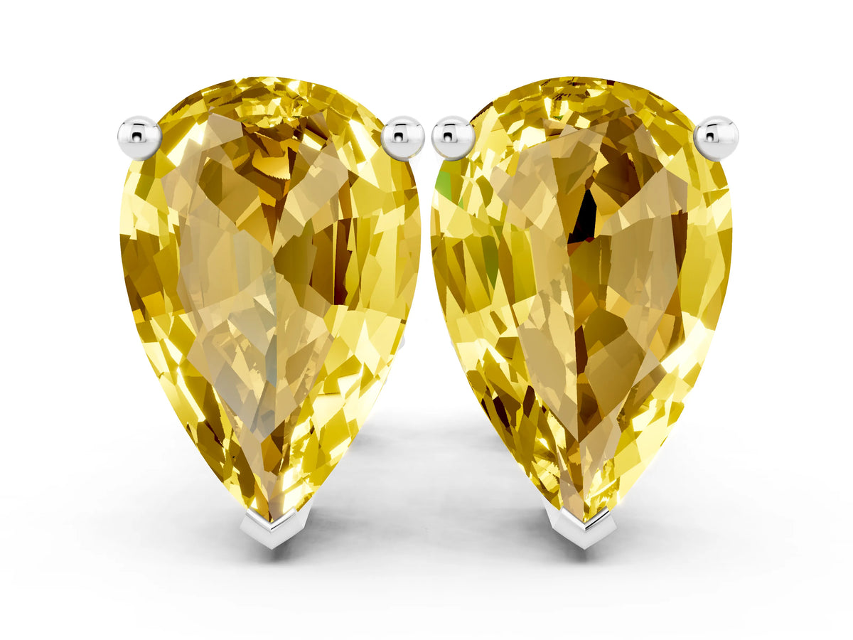 Pear Cut Yellow Sapphire Stud Earrings in White gold with Basket Setting