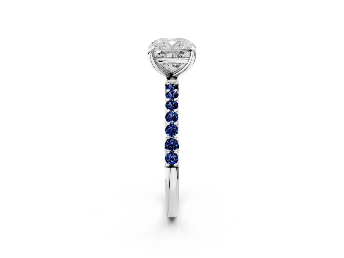 Platinum Cushion Cut Diamond Solitaire Ring with Round Blue Sapphire Pavé Band and Prong Setting_14