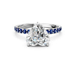 Platinum Heart Cut Diamond Solitaire Ring with Round Blue Sapphire Pavé Band and Prong Setting_12