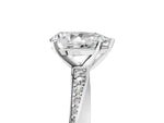 Platinum Pear Cut Diamond Engagement Ring with Side Stone Accents and Four-Prong Setting_11