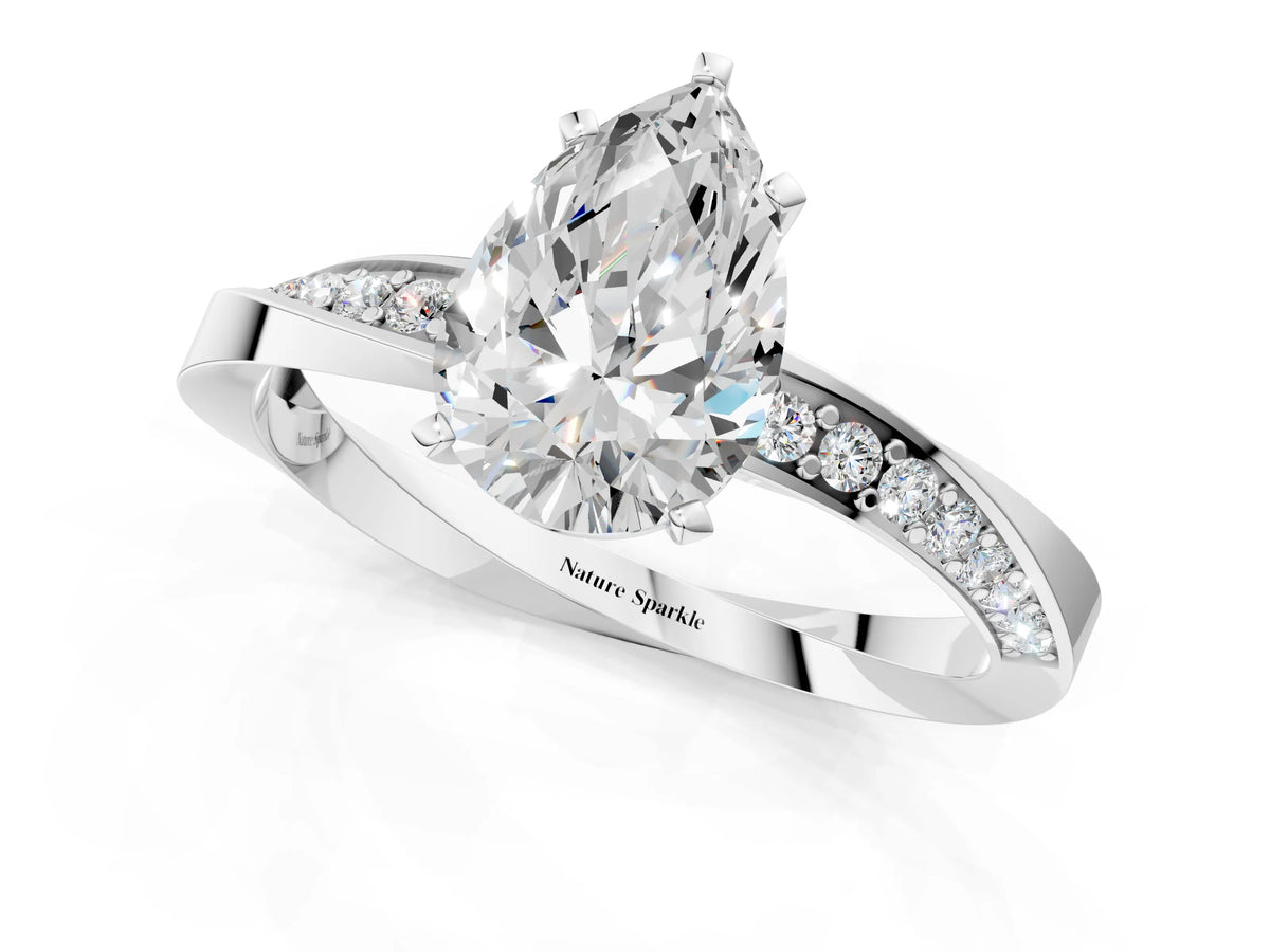 Platinum Pear Cut Diamond Engagement Ring with Side Stone Accents and Four-Prong Setting_7