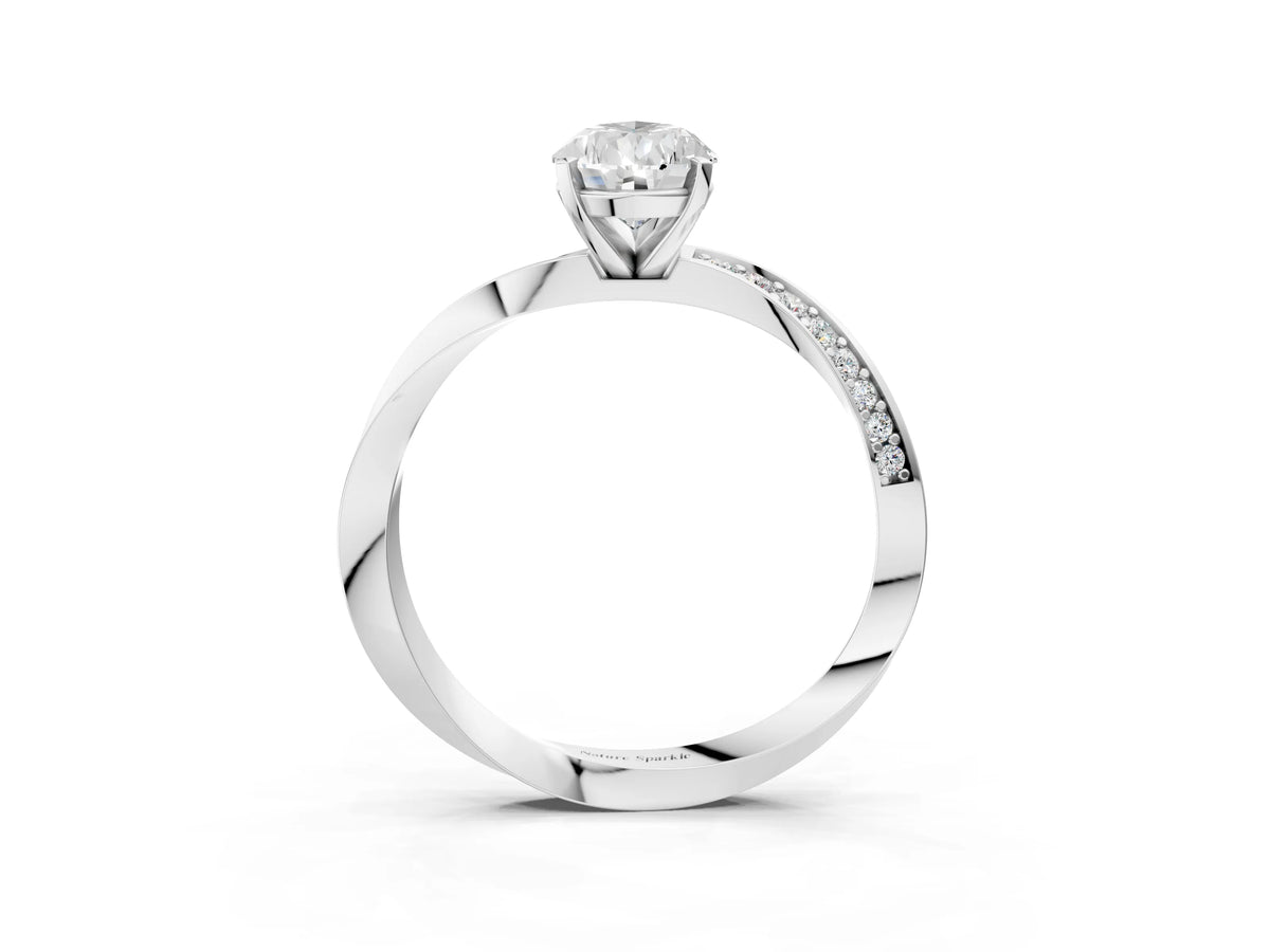 Platinum Pear Cut Diamond Engagement Ring with Side Stone Accents and Four-Prong Setting_9