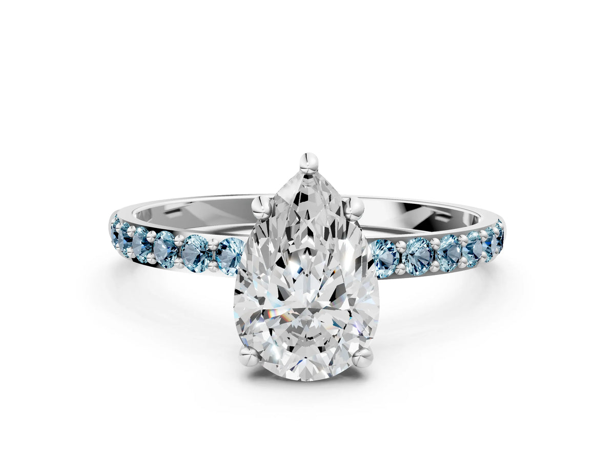 Platinum Pear Cut Diamond Solitaire Ring with Round Aquamarine Pavé Band and Prong Setting_12