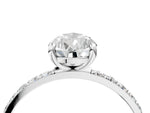 Platinum Pear Cut Diamond Solitaire Ring with Round Moissanite Pavé Band and Prong Setting_16