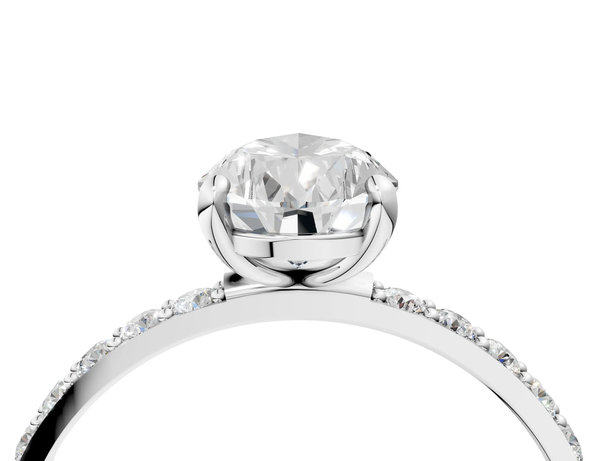 Platinum Pear Cut Diamond Solitaire Ring with Round Moissanite Pavé Band and Prong Setting_16