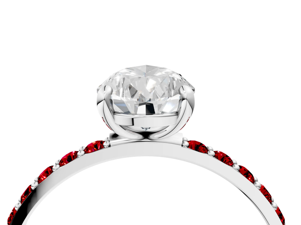 Platinum Pear Cut Diamond Solitaire Ring with Round Ruby Pavé Band and Prong Setting_16