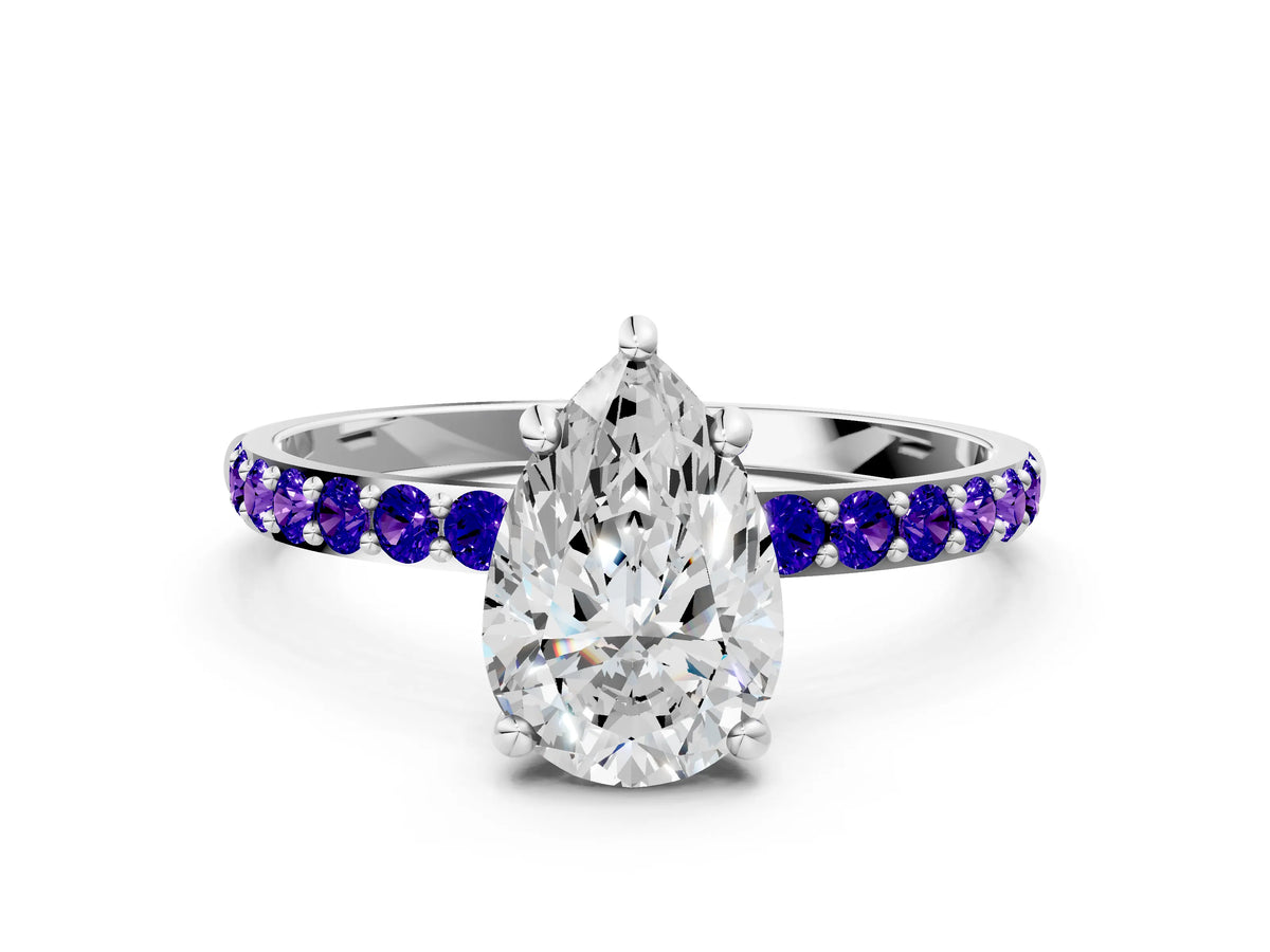 Platinum Pear Cut Diamond Solitaire Ring with Round Tanzanite Pavé Band and Prong Setting_12
