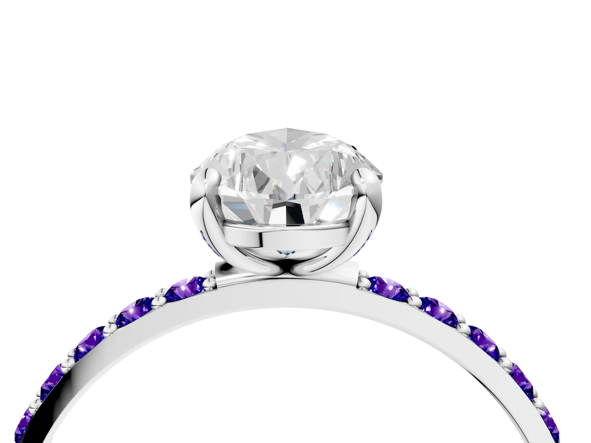 Platinum Pear Cut Diamond Solitaire Ring with Round Tanzanite Pavé Band and Prong Setting_16