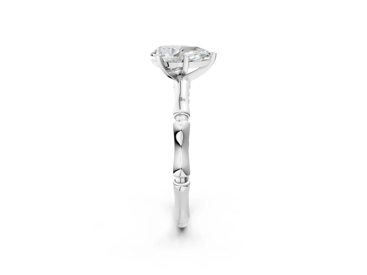 Platinum Pear Cut Solitaire Diamond Ring with Bamboo Band and Four-Prong Setting_14