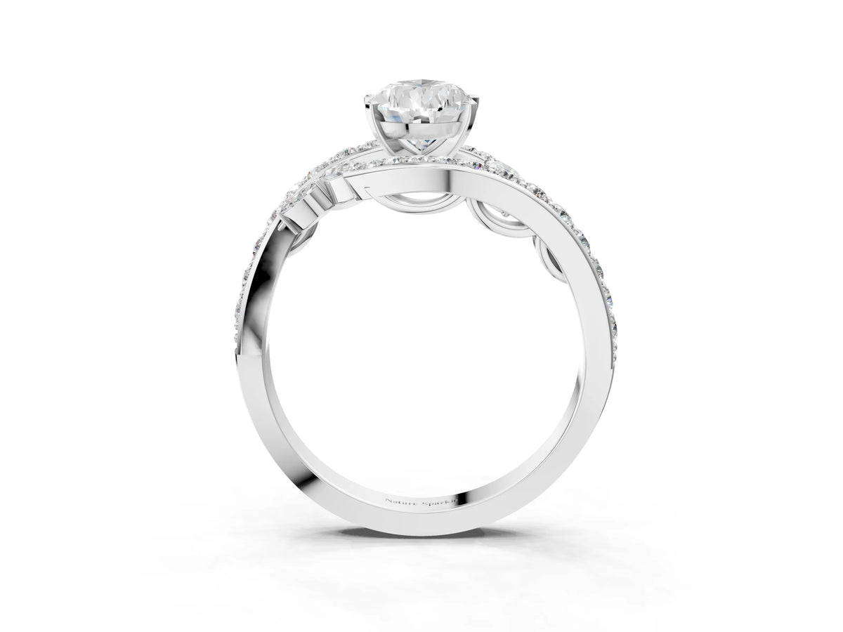 Platinum Pear Cut Solitaire with Pavé Twist Band and Four-Prong Setting_9