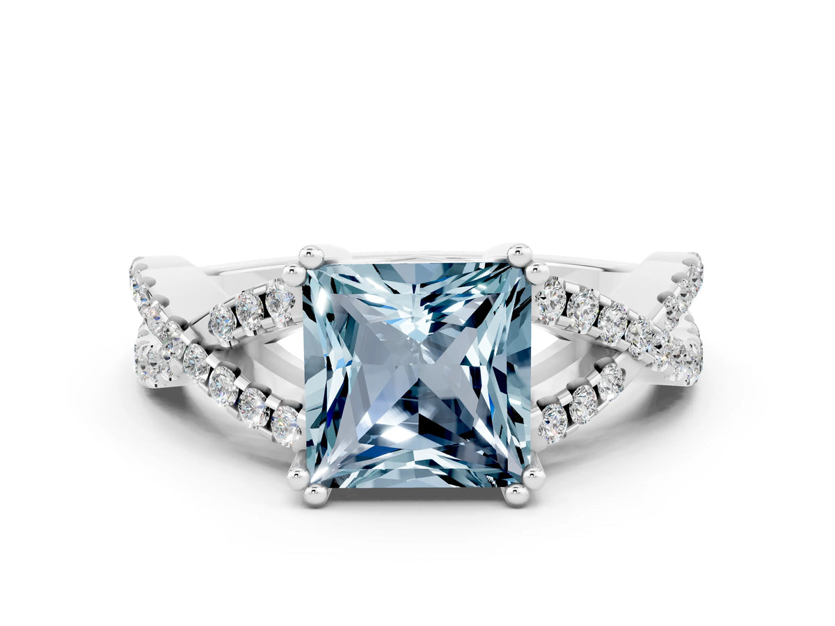 Princess Cut Aquamarine Solitaire Ring in White gold with Interwoven Pavé Band and Prong Setting