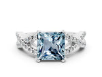 Princess Cut Aquamarine Solitaire Ring in White gold with Interwoven Pavé Band and Prong Setting