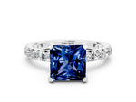 Princess Cut Blue Sapphire Pavé Solitaire Ring in Silver with Round Pavé Band and Prong Setting