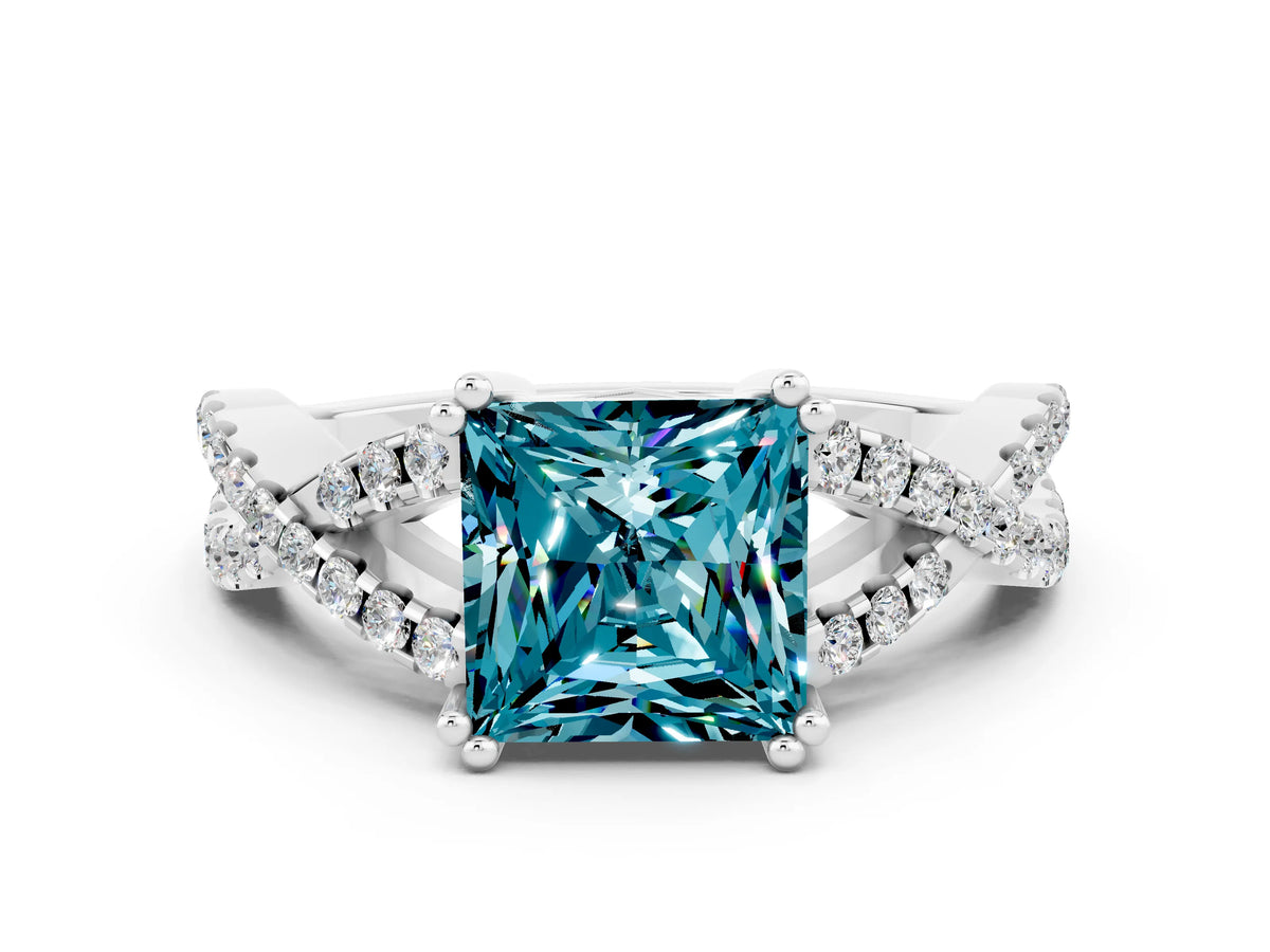 Princess Cut Blue Topaz Solitaire Ring in White gold with Interwoven Pavé Band and Prong Setting