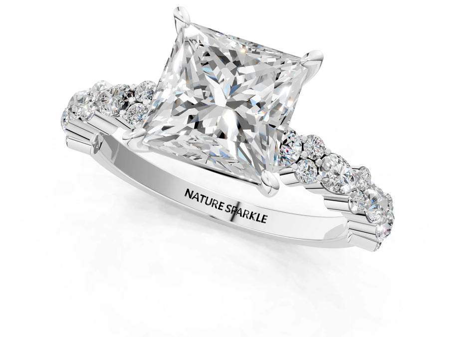 Princess Cut Diamond Solitaire Ring in White gold with Pear and Round Cluster Band