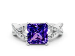 Princess Cut Tanzanite Solitaire Ring in White gold with Interwoven Pavé Band and Prong Setting