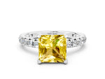 Princess Cut Yellow Sapphire Pavé Solitaire Ring in White gold with Round Pavé Band and Prong Setting