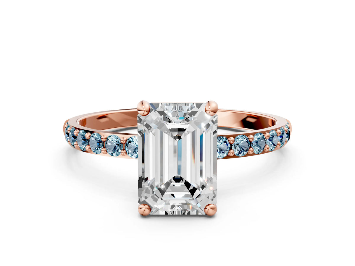 Rose gold Emerald Cut Diamond Solitaire Ring with Round Aquamarine Pavé Band and Prong Setting