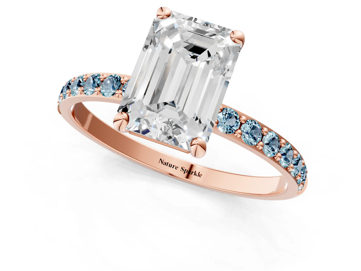 Rose gold Emerald Cut Diamond Solitaire Ring with Round Aquamarine Pavé Band and Prong Setting_1
