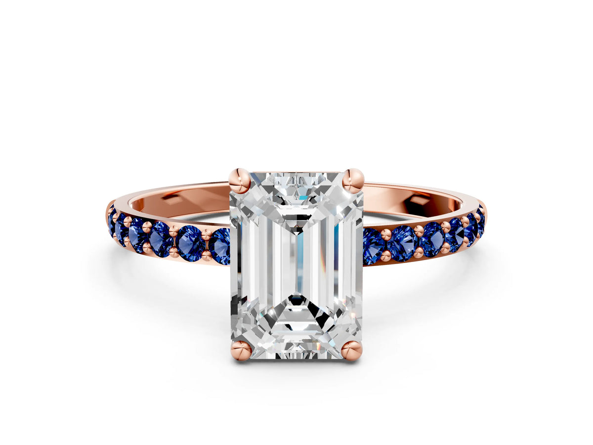 Rose gold Emerald Cut Diamond Solitaire Ring with Round Blue Sapphire Pavé Band and Prong Setting
