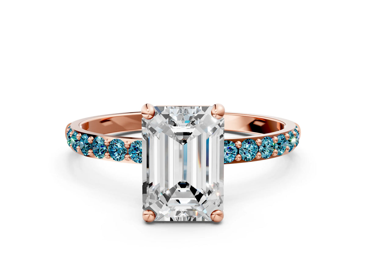 Rose gold Emerald Cut Diamond Solitaire Ring with Round Blue Topaz Pavé Band and Prong Setting