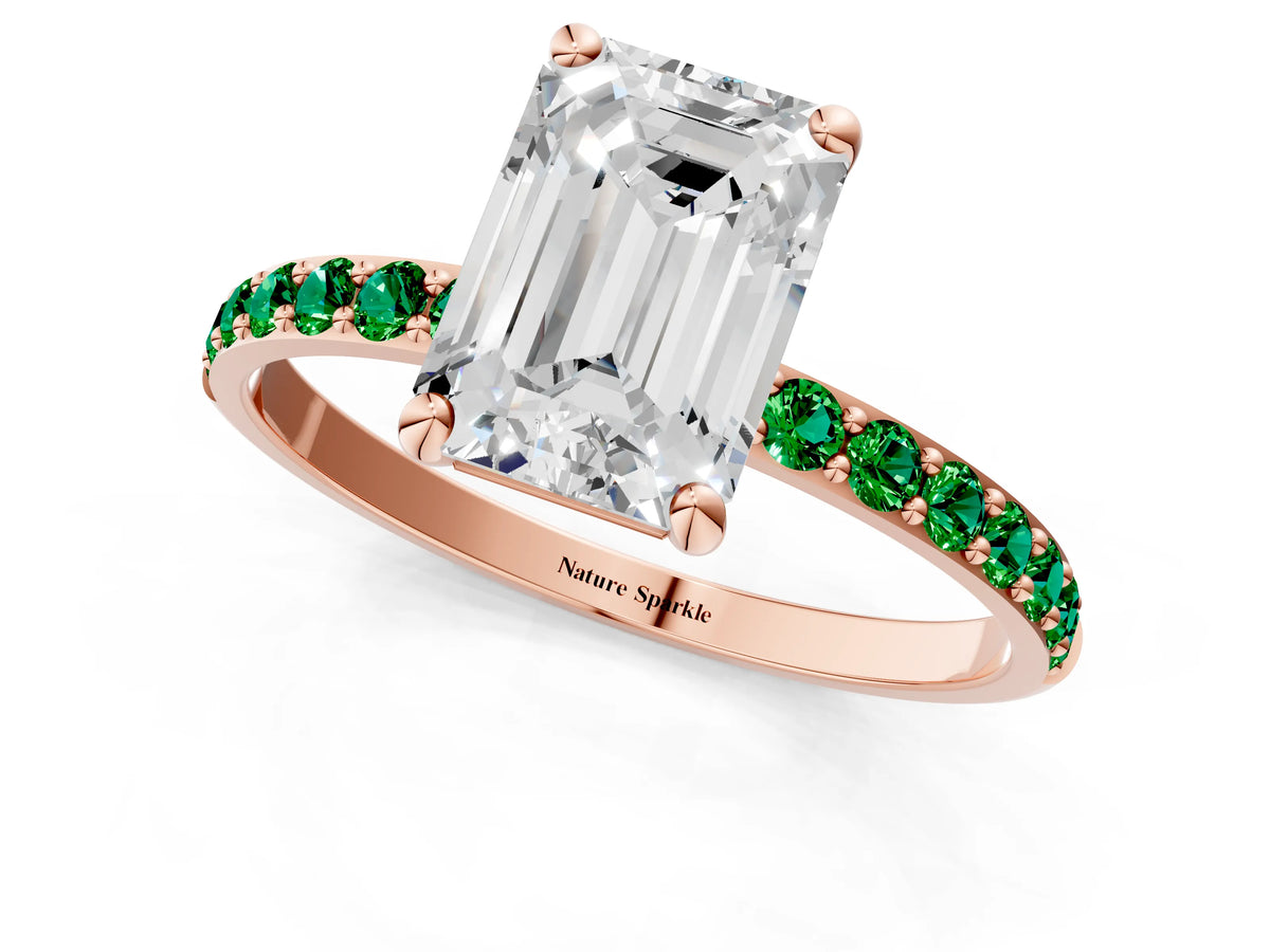 Rose gold Emerald Cut Diamond Solitaire Ring with Round Emerald Pavé Band and Prong Setting_1