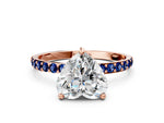 Rose gold Heart Cut Diamond Solitaire Ring with Round Blue Sapphire Pavé Band and Prong Setting