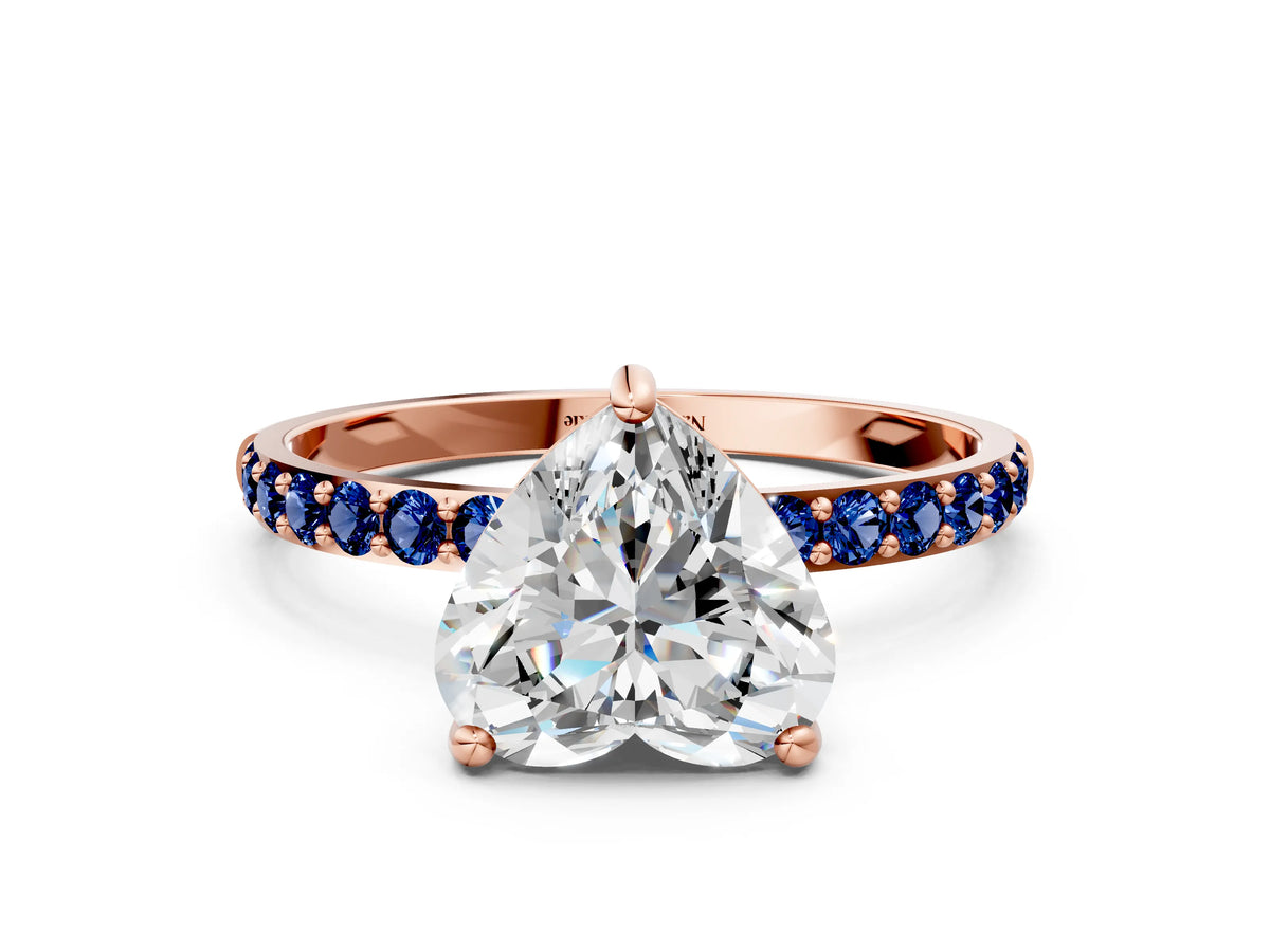 Rose gold Heart Cut Diamond Solitaire Ring with Round Blue Sapphire Pavé Band and Prong Setting