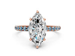 Rose gold Marquise Cut Diamond Solitaire Ring with Round Aquamarine Pavé Band and Prong Setting