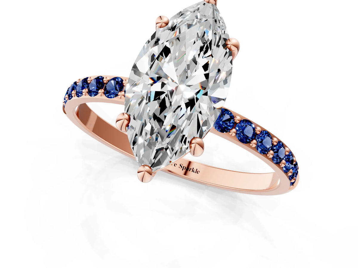 Rose gold Marquise Cut Diamond Solitaire Ring with Round Blue Sapphire Pavé Band and Prong Setting_1