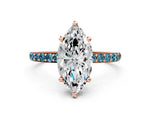 Rose gold Marquise Cut Diamond Solitaire Ring with Round Blue Topaz Pavé Band and Prong Setting