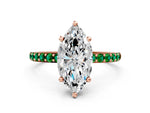 Rose gold Marquise Cut Diamond Solitaire Ring with Round Emerald Pavé Band and Prong Setting