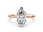 Rose gold Marquise Cut Solitaire Diamond Ring with Bamboo Band and Four-Prong Setting