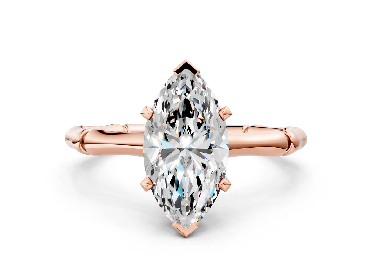 Rose gold Marquise Cut Solitaire Diamond Ring with Bamboo Band and Four-Prong Setting