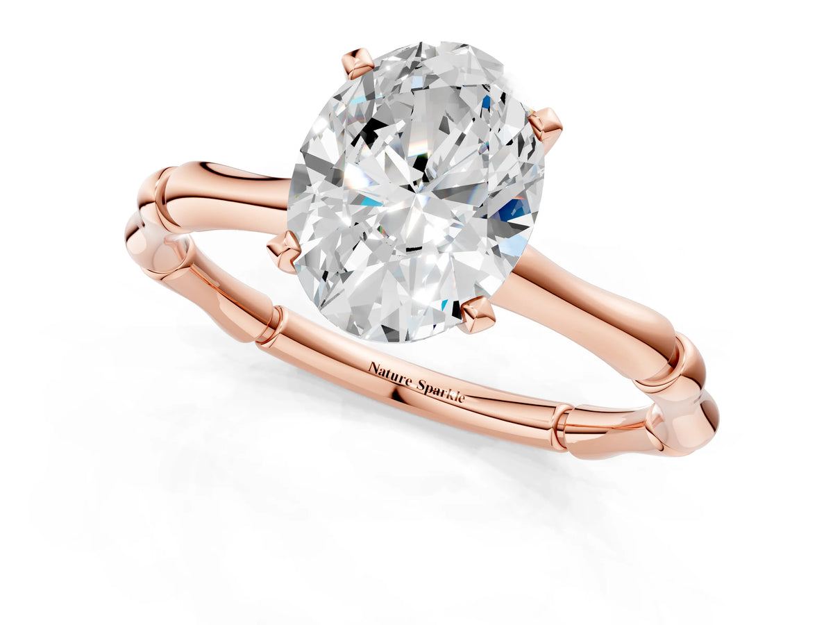Rose gold Oval Cut Solitaire Diamond Ring with Bamboo Band and Four-Prong Setting_1
