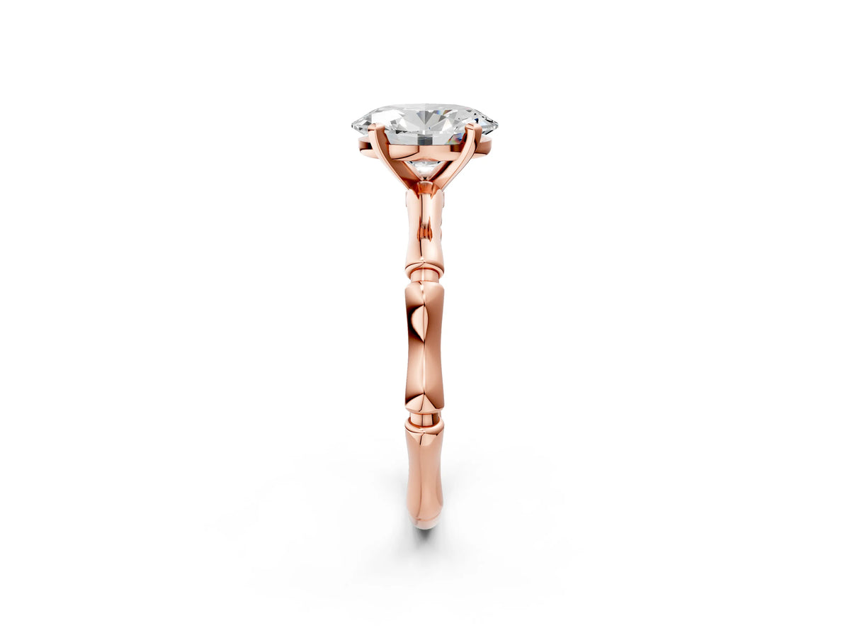 Rose gold Oval Cut Solitaire Diamond Ring with Bamboo Band and Four-Prong Setting_2