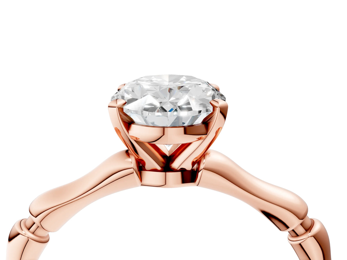 Rose gold Oval Cut Solitaire Diamond Ring with Bamboo Band and Four-Prong Setting_4