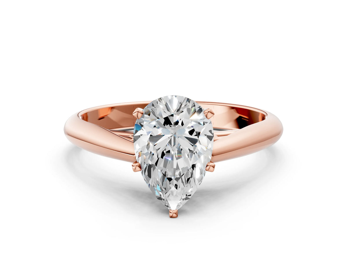Rose gold Pear Cut Diamond Solitaire Engagement Ring with Cathedral Setting and Four-Prong Mount