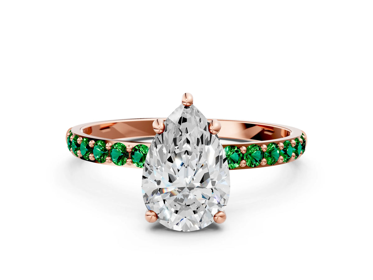 Rose gold Pear Cut Diamond Solitaire Ring with Round Emerald Pavé Band and Prong Setting