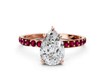 Rose gold Pear Cut Diamond Solitaire Ring with Round Garnet Pavé Band and Prong Setting