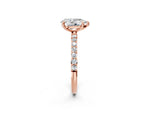 Rose gold Pear Cut Diamond Solitaire Ring with Round Moissanite Pavé Band and Prong Setting_2