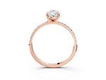Rose gold Pear Cut Diamond Solitaire Ring with Round Moissanite Pavé Band and Prong Setting_3