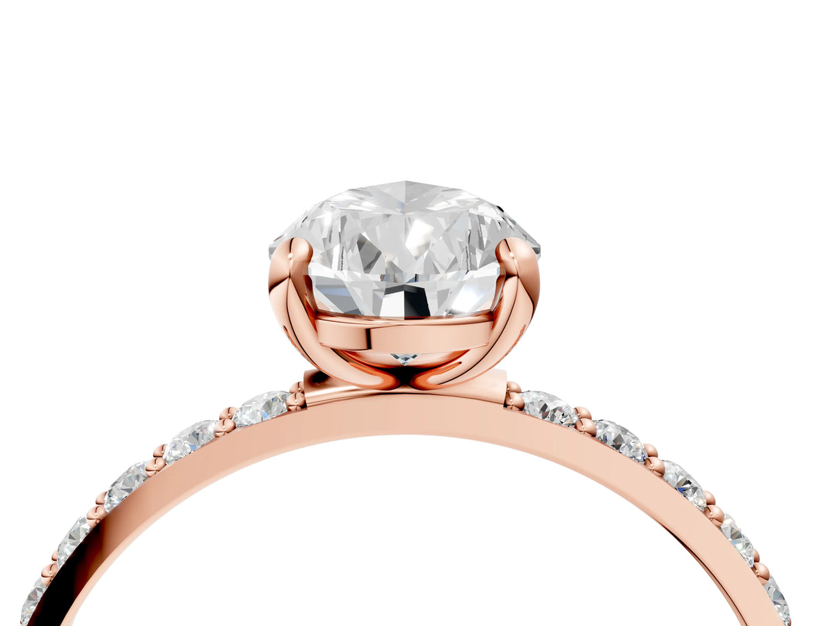 Rose gold Pear Cut Diamond Solitaire Ring with Round Moissanite Pavé Band and Prong Setting_4