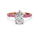 Rose gold Pear Cut Diamond Solitaire Ring with Round Pink Sapphire Pavé Band and Prong Setting