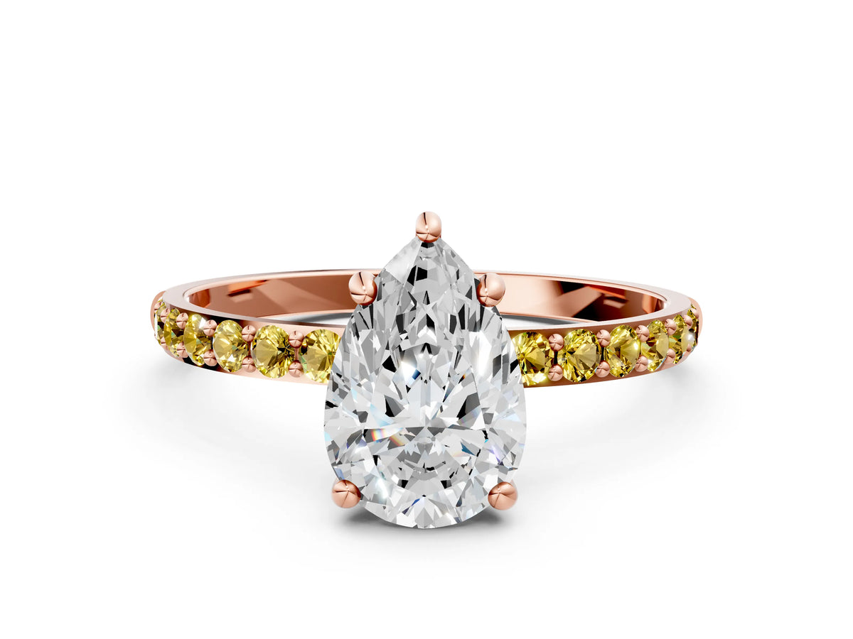 Rose gold Pear Cut Diamond Solitaire Ring with Round Yellow Sapphire Pavé Band and Prong Setting