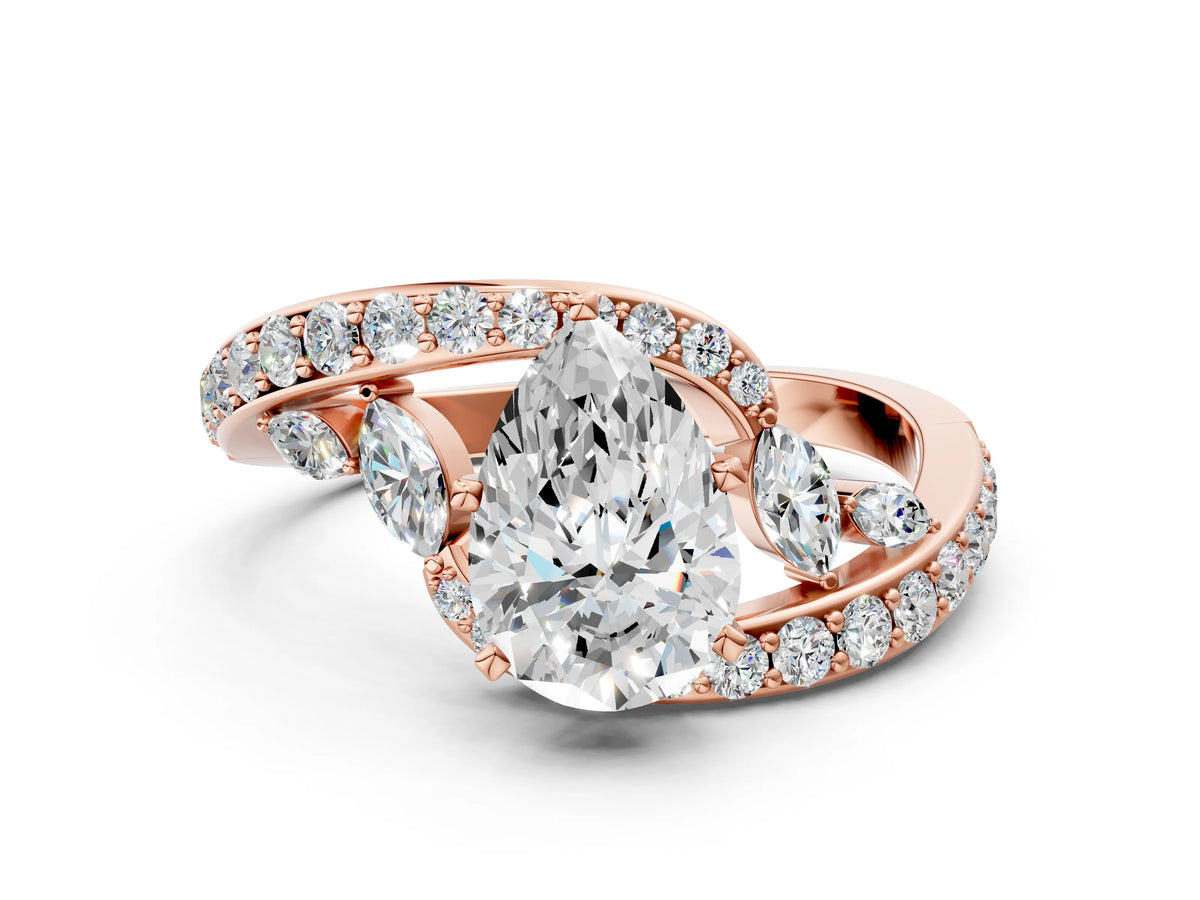 Rose gold Pear Cut Solitaire with Pavé Twist Band and Four-Prong Setting