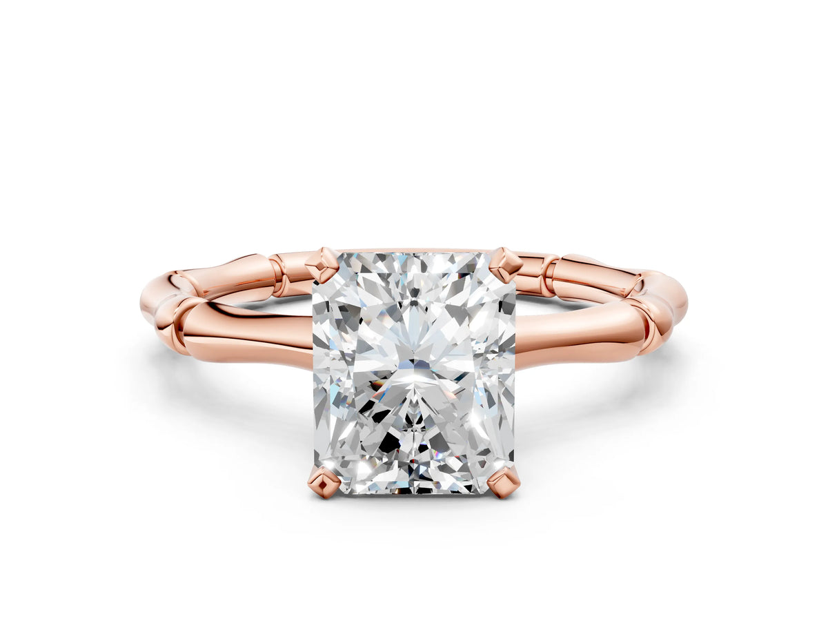 Rose gold Radiant Cut Solitaire Diamond Ring with Bamboo Band and Four-Prong Setting