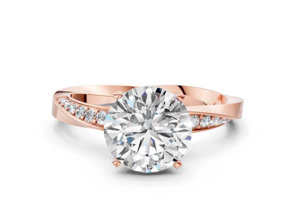 Rose gold Round Cut Diamond Engagement Ring with Side Stone Accents and Four-Prong Setting