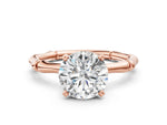 Rose gold Round Cut Solitaire Diamond Ring with Bamboo Band and Four-Prong Setting